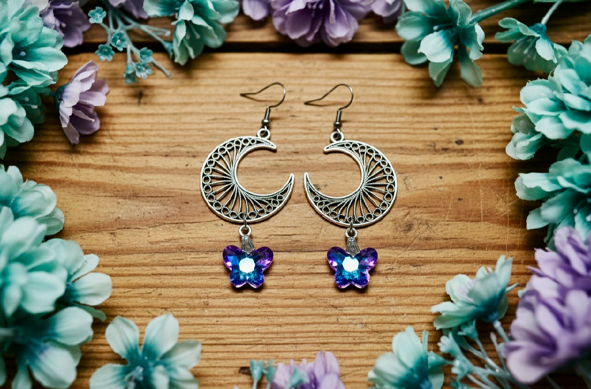 Ornate Tin Alloy Crescent Moon Earrings with Light-Reflecting Butterfly Prisms