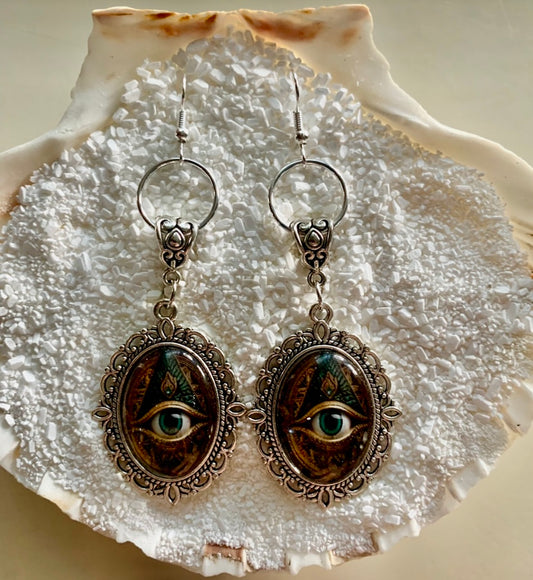 Ornate Gothic Blue-Eyed Oval Earrings